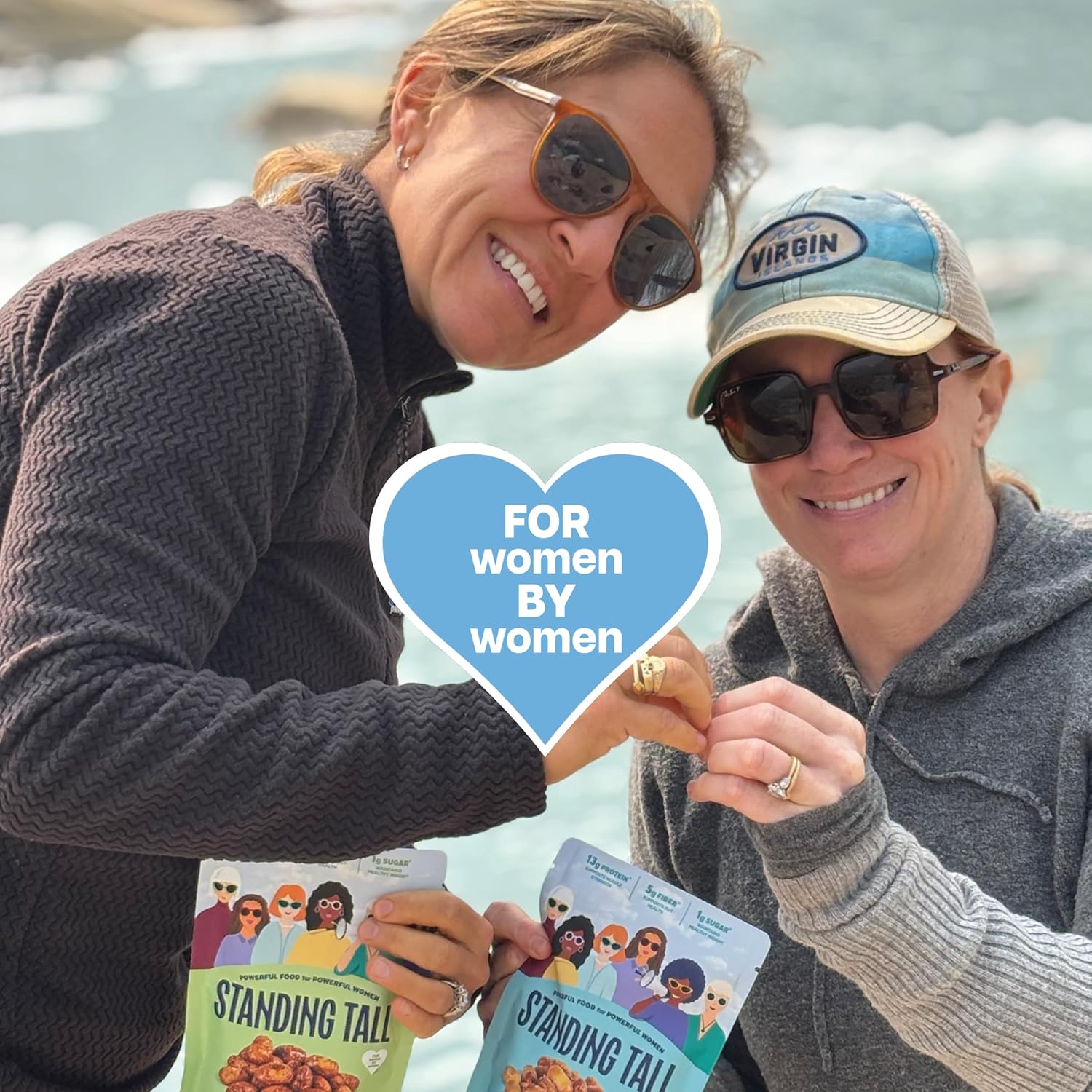 Two women standing tall snacks and living a healthy life enjoying life